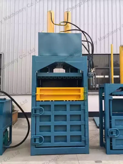 Garment waste hydraulic baler