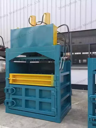 Textile waste baler machine